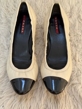 ✨ PREOWNED ✨💯% AUTHENTIC Prada Leather Ballet Flats with Black Patent Cap Toe